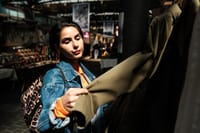 Woman shops for clothes