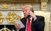 President Donald Trump on the phone