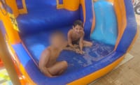 The two boys playing in the pool before the attack where Hillel was killed
