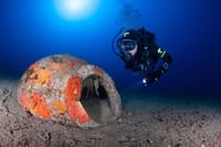 Diver next to the veseel that was discovered