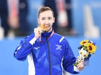 Artem Dolgopyat holds his gold medal