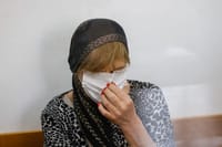 Woman crying in court 