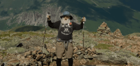 Sanders shouts 'Thank You, Creator' at the trail's end