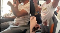 Passenger whose shirt is stained with blood