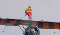 Helga Duffey on the wing of an aircraft