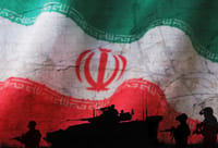 Conceptual image of war between Israel and Iran, using flag and silhouette