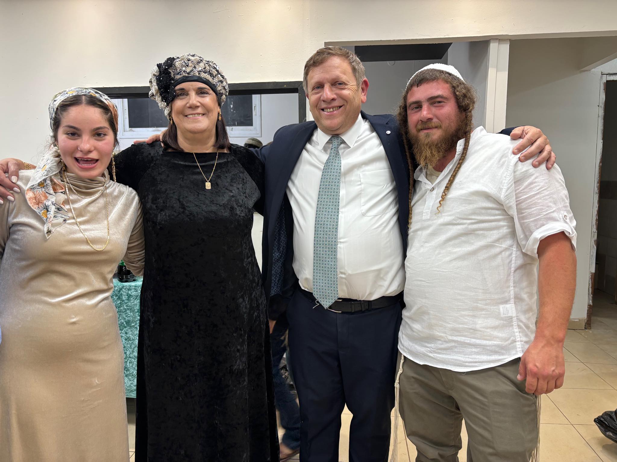 Yehoshua Gilbitz, bereaved parents Chagai and Techiya Luber, and Aviya
