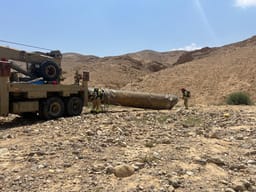 Preparing the intercepted missile for removal.