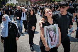 Family and friends attend the funeral service of druze children, Majdal Shams, in the Golan Heights, July 28, 2024.