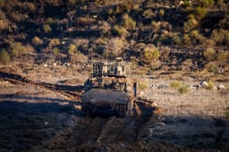 Israeli soldiers operating in the Syrian side of the border fence with Israel, northern Israel, December 25, 2024.