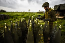 A soldier prepares 155m shells for firing during IDF military training in the Golan Heights 