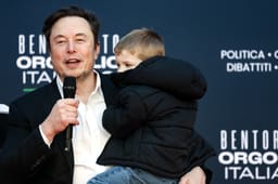 Elon Musk, chief executive officer of Tesla Inc., and his son 