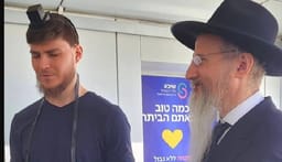 Sasha Trufanov with the Chief Rabbi