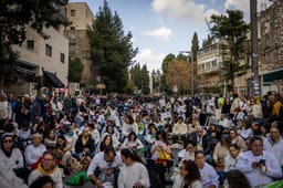 Families of Israelis held hostage in the Gaza Strip and supporters attend a silent protest calling for the release of Israelis held hostage in the Gaza Strip, outside the Prime Minister's residence in Jerusalem, February 17, 2025