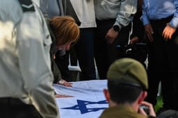 Zahava Shaul, mother of late Israeli soldier Oron Shaul mourn during her son funeral at the cemetery in Poria Illit on January 20, 2025. 