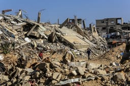 Palestinians live among the rubble of their homes which were destroyed in the war between Israel and Hamas, in the city of Khan Yunis, southern Gaza Strip. 