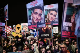 Israelis attend a rally calling for the release of Israelis held hostage by Hamas terrorists in Gaza, at "Hostage Square" in Tel Aviv, February 22, 2025