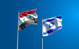 Israel and Syrian flags.
