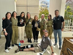 Alon and Ella at the hospital with IDF soldiers