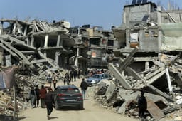 Palestinians live among the rubble of their homes which were destroyed in the war between Israel and Hamas, in the city of Khan Yunis, southern Gaza Strip