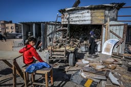 Palestinians sell firewood for cooking in Khan Yunis, in the southern Gaza Strip, due to a lack of cooking gas, March 12, 2025.