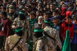Hamas, Islamic Jihad and thousands of People outside the house of Sinwar in Khan Younis, where two Israeli hostages and 5 Thai hostages were released to the Red Cross as part of a deal between Israel and Hamas, January 30, 2025.