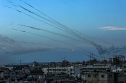 Hamas fires a large number of rockets towards Israel in the city of Rafah in the southern Gaza Strip, October 7, 2023