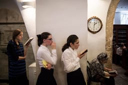Religious Jewish girls praying