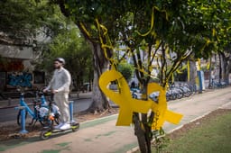 Yellow ribbons calling for the release of the Israeli hostages held by Hamas terrorists in captivity, seen lining Rothschild Boulevard in Tel Aviv. March 25, 2025. 