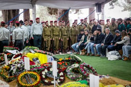 Family and friends of Israeli soldier attend the funeral of Sergeant first class Yona Betzalel Brief at Mount Herzl Military Cemetery in Jerusalem on November 27, 2024. 