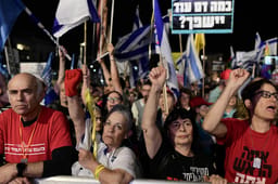 People protest against Prime Minister Benjamin Netanyahu and his government, at Habima Square, March 27, 2025. 