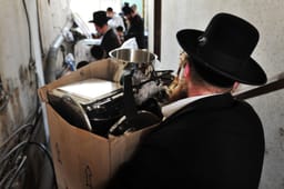 Jews preparing for Pesach cleaning