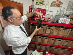 Moshe Mannes' Judaica bottle collection
