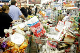 Israelis do food shopping before the Jewish holiday of Passover