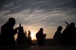 Followers of the late Rabbi Meir Kahane, founder of both the Jewish Defense League (JDL) and "Kach" an Israeli political party, pray at his grave at the Givat Shaul cemetery