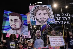 Demonstrators protest against the Israeli government and for the release of Israelis held hostage in the Gaza Strip outside Hakirya Base in Tel Aviv, May 10, 2025. 