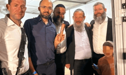 Hananel Gez affixing the mezuzah in memory of his late wife Tse'ela Gez HY'D
