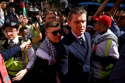 Irish rap group Kneecap singer, Liam O'Hanna center, who performs under the stage name Mo Chara, face judgement for supporting Hezbollah
