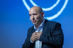 Former Israeli Prime Minister Naftali Bennett speaks during a conference with Jerusalem residents ahead of the 2026 general elections, in Jerusalem, November 19, 2025. 