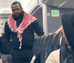 American airlines attendant wear a keffiyeh