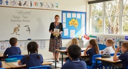 Australian teacher and children in classroom