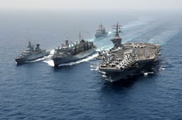 Aircraft Carrier with Naval fleet