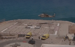 Helicopter transports 2 wounded soldiers
