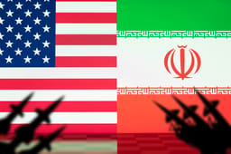 Flags of the United States and Iran with missile launchers in silhouette, portraying the rising conflict and danger of war between the two nations.
