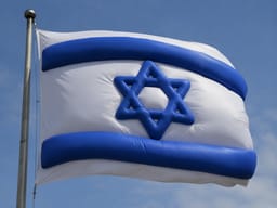 An overweight Israeli flag. Illustration.