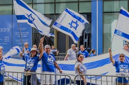 New York, NY USA May 18, 2025: A street level shot of people participating in this year's Israel Day parade on Fifth avenue.