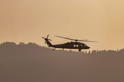 Military helicopter over Lbenaon, May 2026