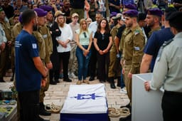 Mourners at the funeral of lsain soldier Rotem Yanai