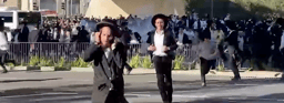 Israel Police save IDF soldier from anti-draft protest