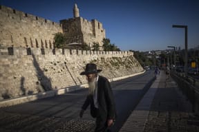 Religious man walks in Jerusalem, July 30, 2026